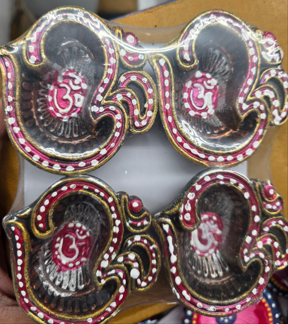 Om shape design colorful Clay diyas (4pieces)