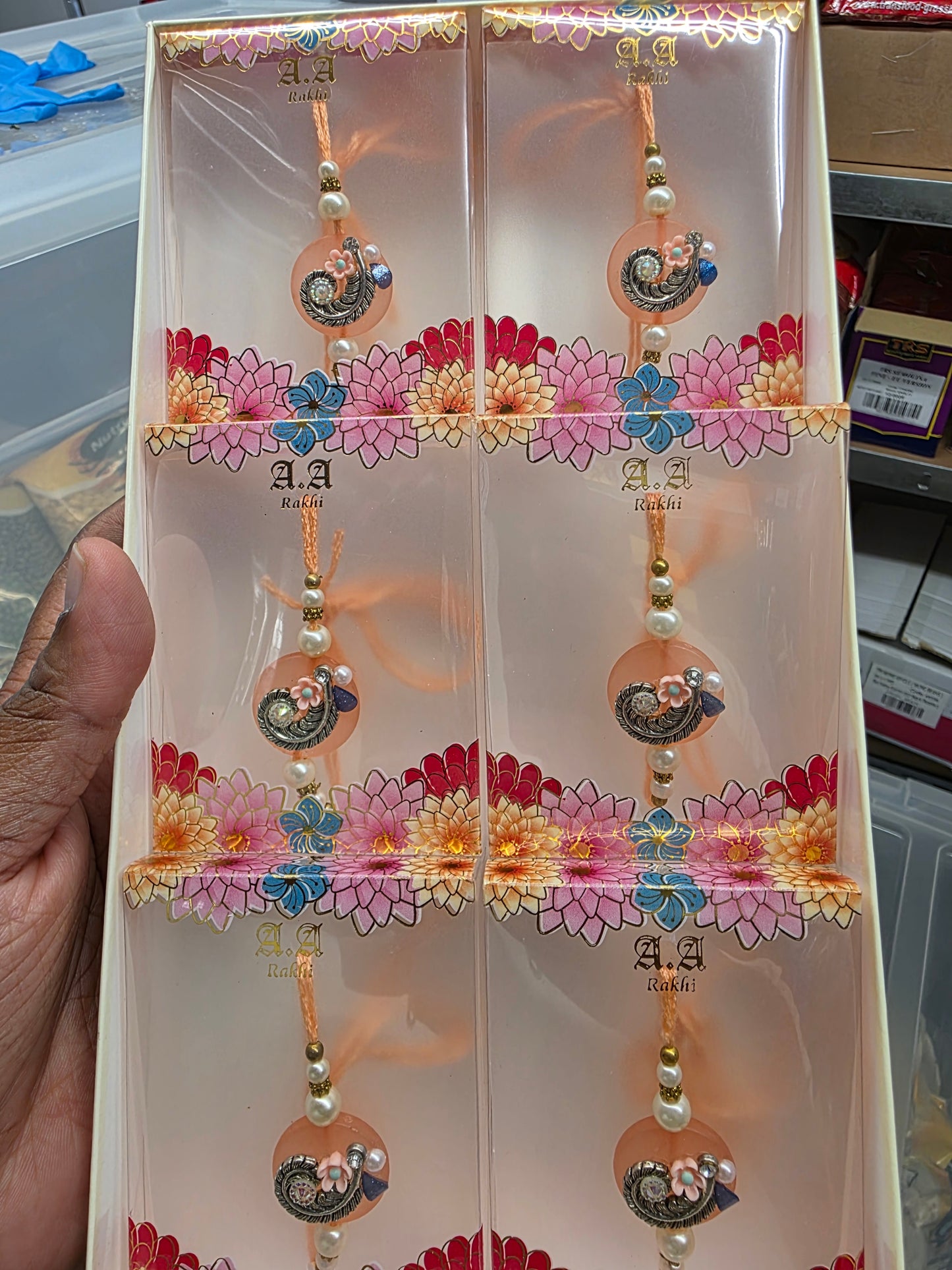 Pink circle shape Rakhi with white beads