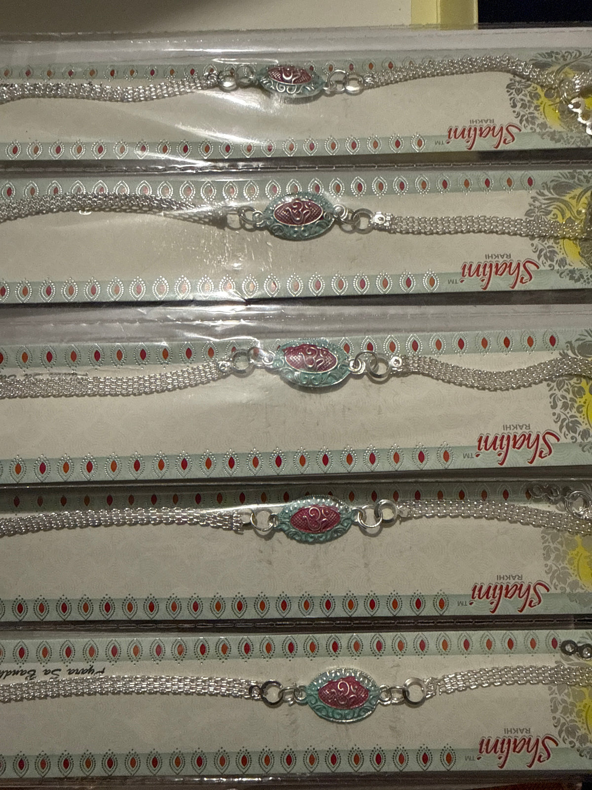OM silver look like Rakhi